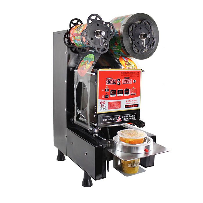 Introducing our Automatic Cup Sealing Machine, the ultimate solution for bubble tea shops and beverage establishments. Specifically designed for sealing cups filled with delicious bubble teas and other specialty beverages, this machine offers unparalleled efficiency and convenience. With its automatic operation and customizable settings, our cup sealing machine streamlines the packaging process, ensuring a consistent and professional seal every time. Say goodbye to manual sealing and hello to effortless automation with our automatic cup sealing machine. Why choose us? Because we prioritize functionality, reliability, and customer satisfaction, ensuring that our machine enhances your bubble tea production process and helps you deliver the perfect beverage presentation. Upgrade your beverage offerings and elevate your business with our Automatic Cup Sealing Machine today.